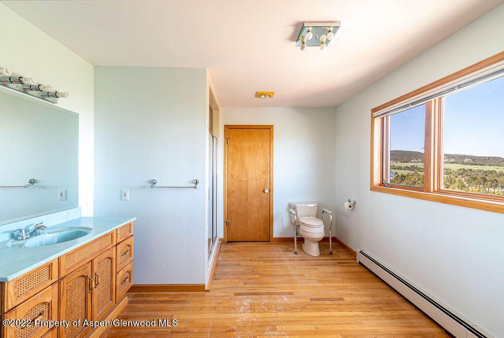 47417 KE Road Mesa, CO 81643 - Photo 10 of 40 a view of a bathroom with dual sinks