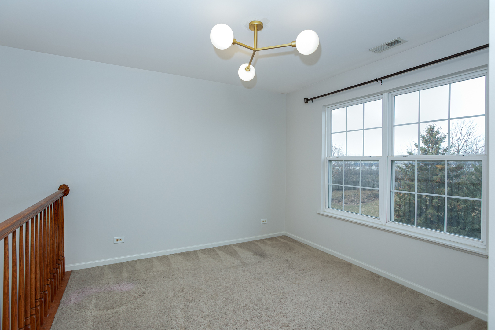 720 Thornbury Road Bartlett, IL 60103 - Photo 12 of 24 an empty room with a window