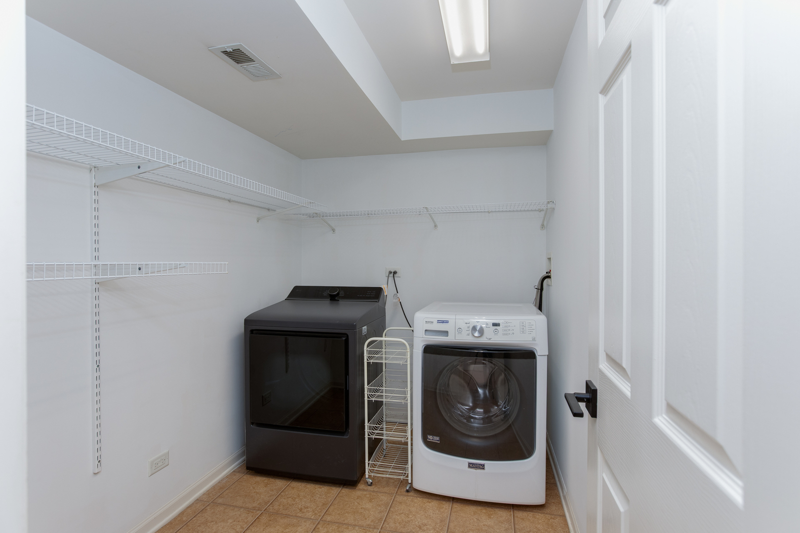 720 Thornbury Road Bartlett, IL 60103 - Photo 15 of 24 a utility room with dryer and washer