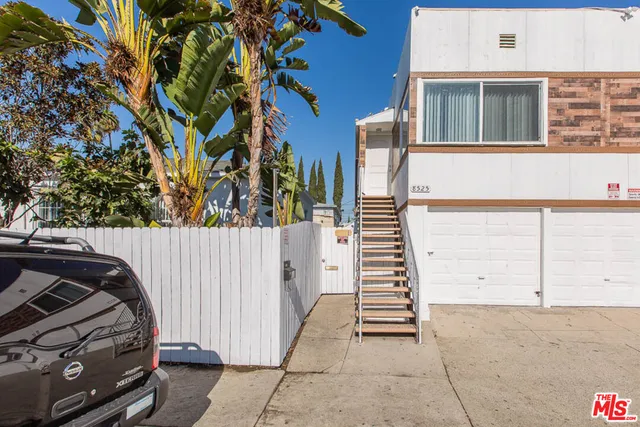 a view of a building with a street