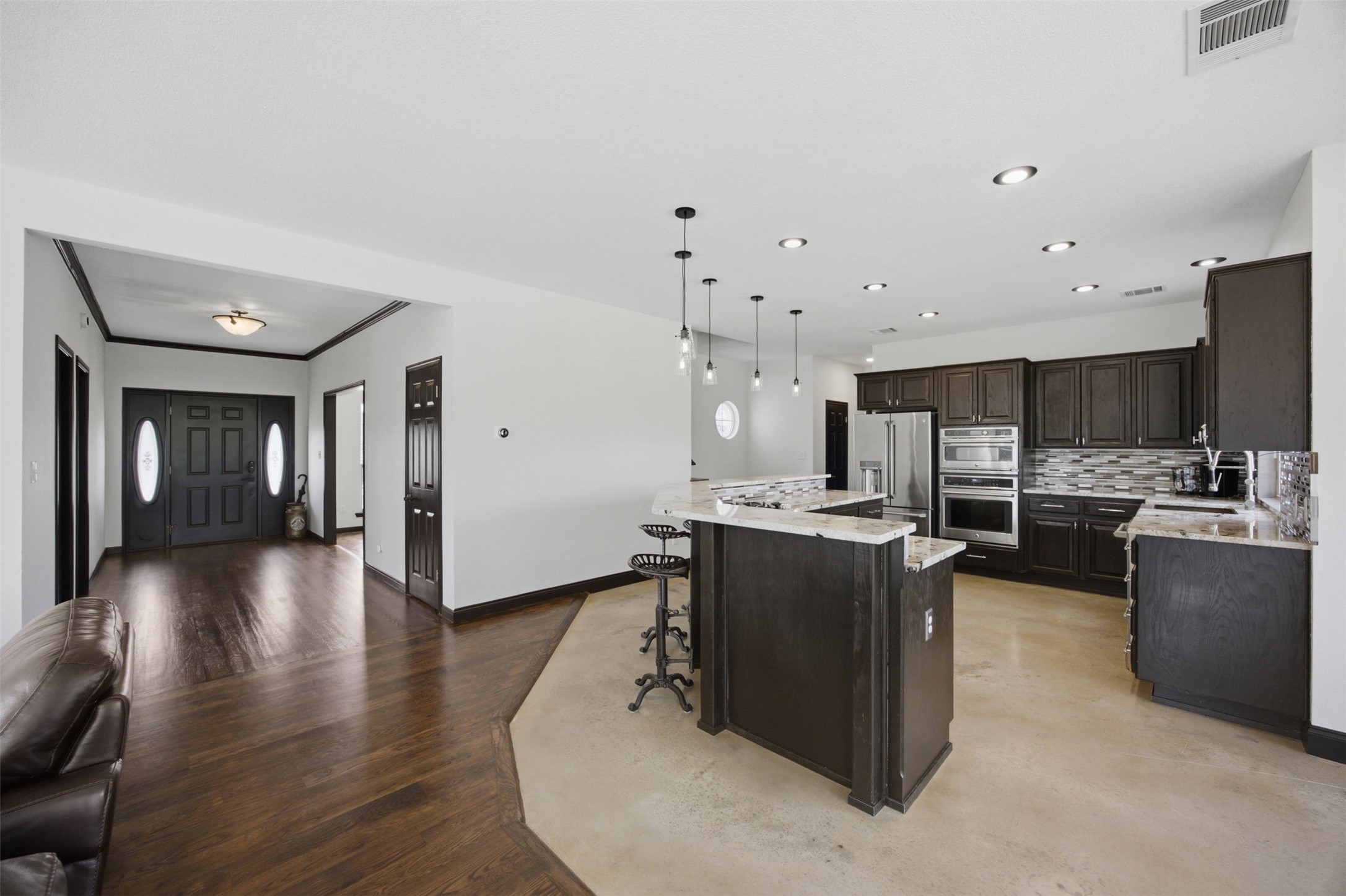 720 Spring Creek Road Florence, TX 76527 - Photo 40 of 40 The floor plan opens up as you pass through the foyer.