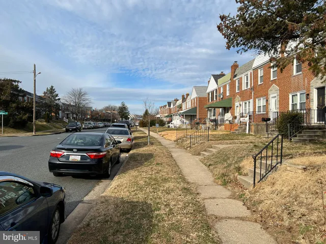 a view of a patio with a yard