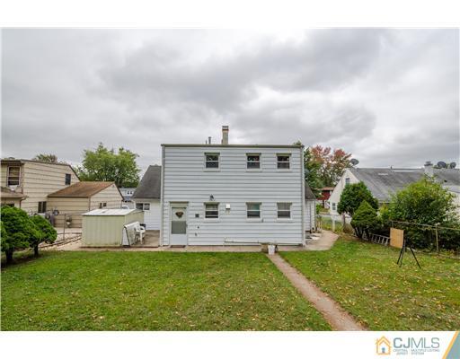 112 Idlewild Road Edison, NJ 08817 - Photo 19 of 20 a view of a house with a backyard