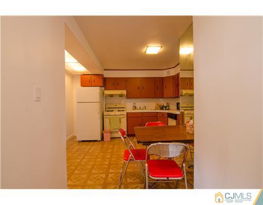 112 Idlewild Road Edison, NJ 08817 - Photo 4 of 20 a view of a room with gym equipment