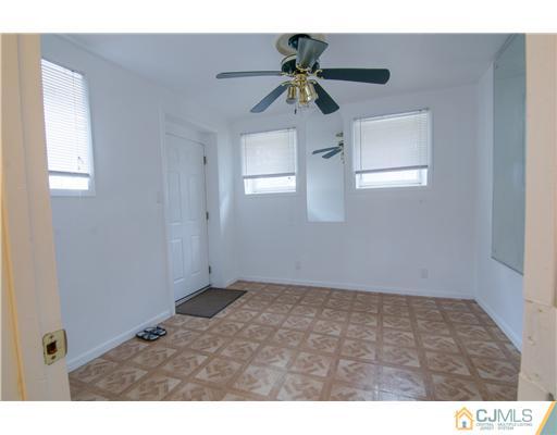 112 Idlewild Road Edison, NJ 08817 - Photo 7 of 20 a view of an empty room