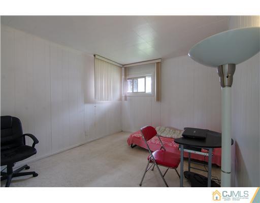 112 Idlewild Road Edison, NJ 08817 - Photo 8 of 20 a living room with furniture