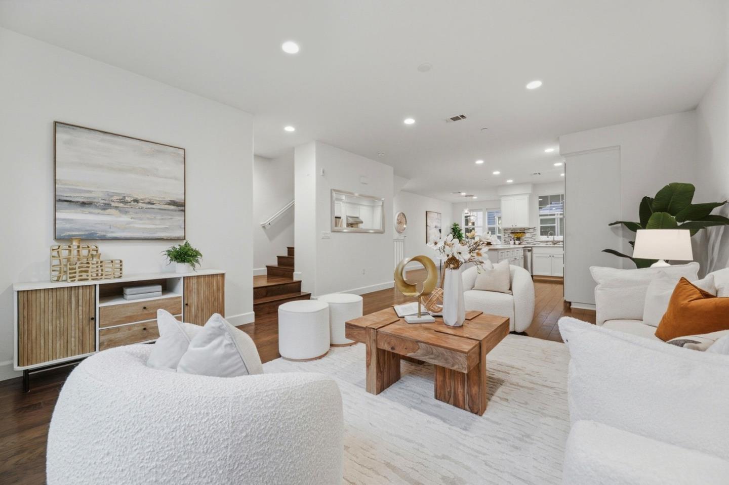 129 Paperbark Terrace Sunnyvale, CA 94086 - Photo 1 of 1 a living room with furniture kitchen view and a table