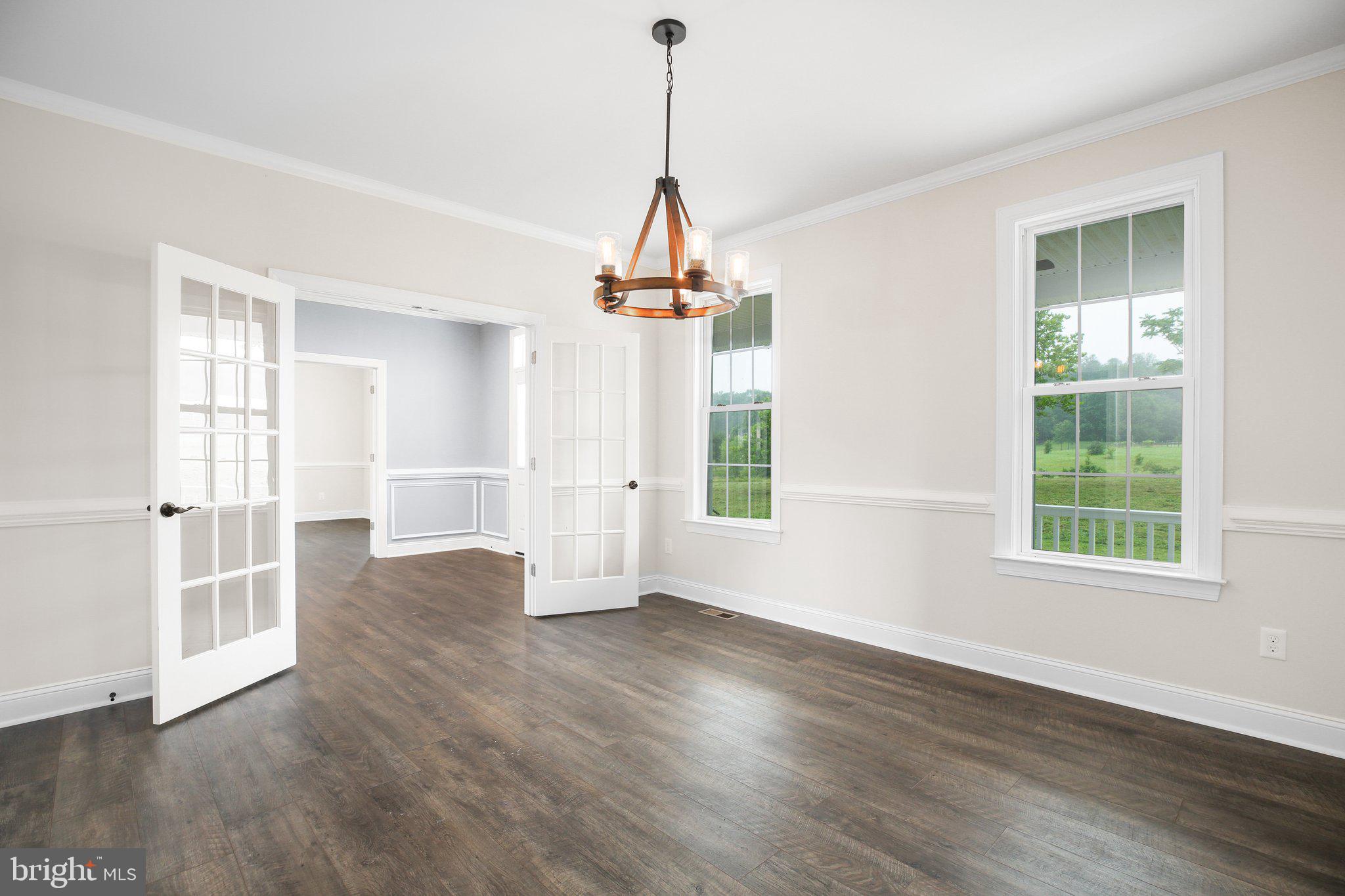 6337 Louisianna Road Locust Grove, VA 22508 - Photo 21 of 75 a view of empty room with wooden floor and windows
