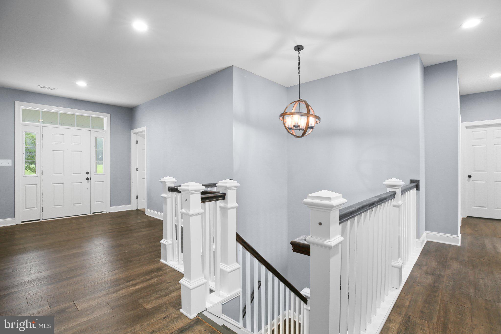 6337 Louisianna Road Locust Grove, VA 22508 - Photo 25 of 75 a view of a room with wooden floor and stairs
