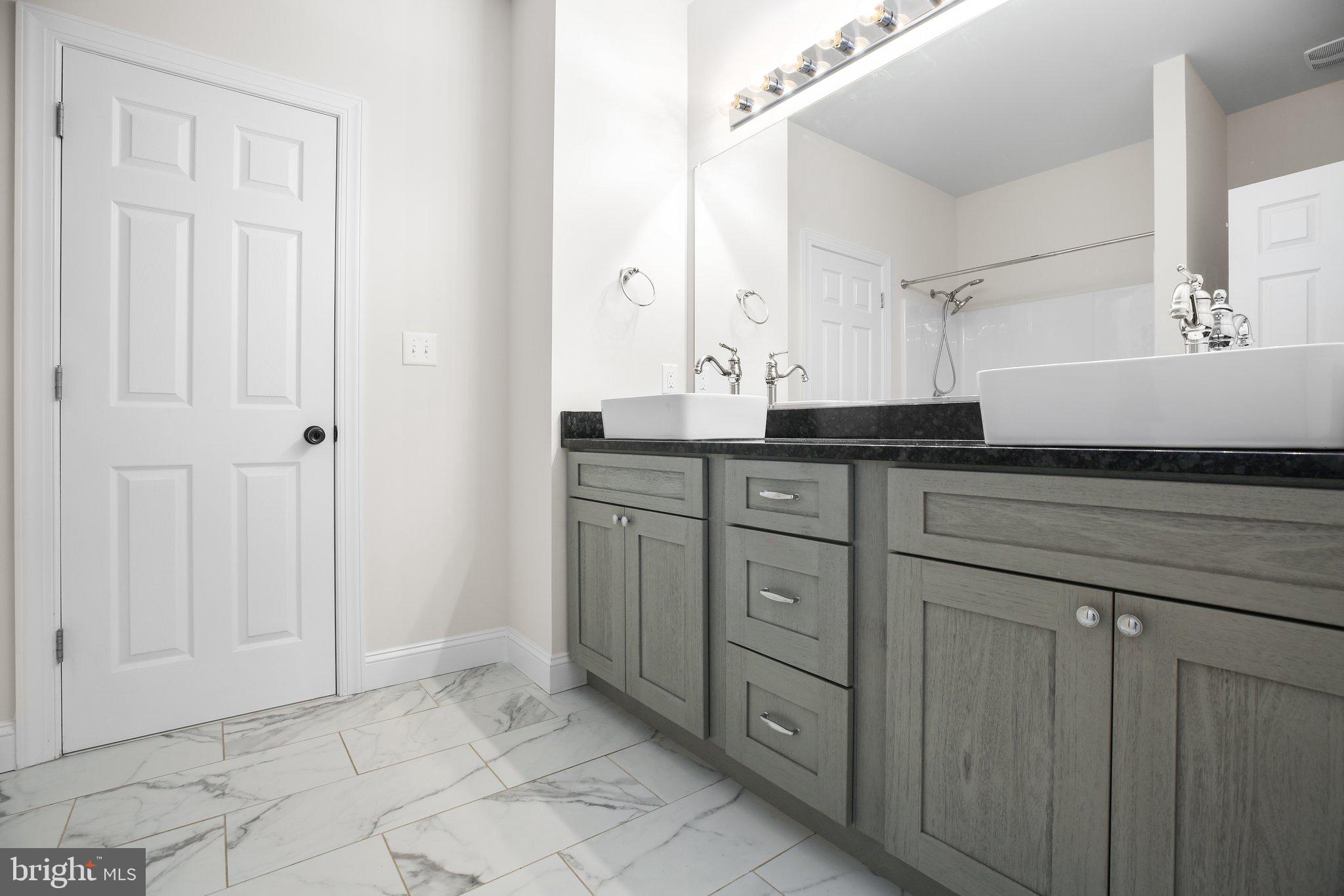 6337 Louisianna Road Locust Grove, VA 22508 - Photo 32 of 75 a kitchen with a granite countertop cabinets and sink