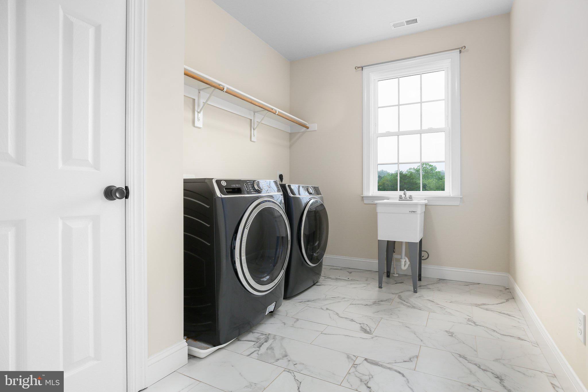 6337 Louisianna Road Locust Grove, VA 22508 - Photo 33 of 75 a utility room with dryer and washer