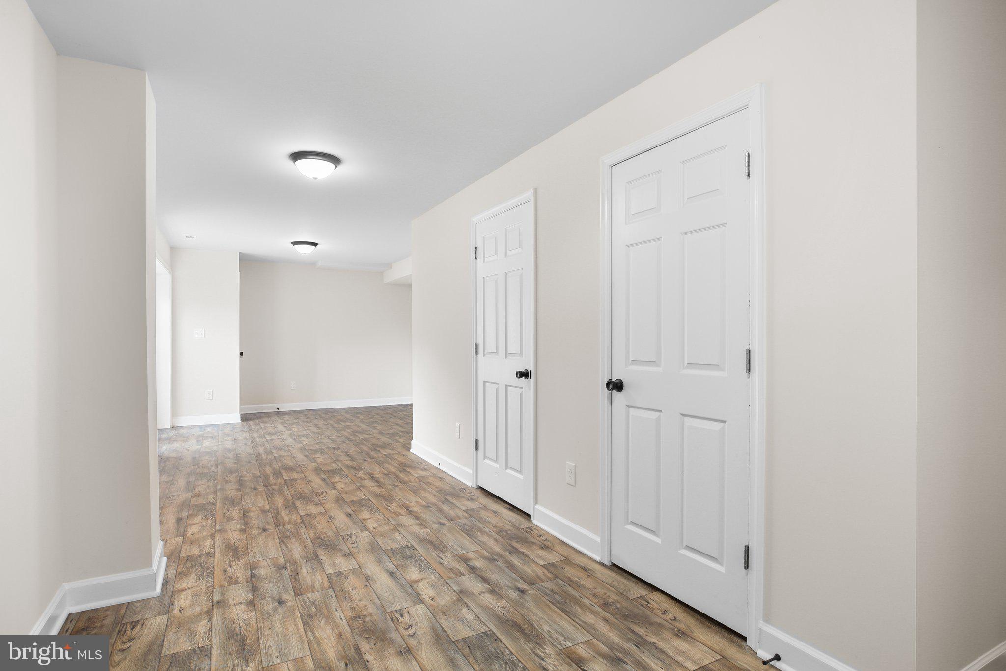 6337 Louisianna Road Locust Grove, VA 22508 - Photo 52 of 75 a view of a hallway with wooden floor
