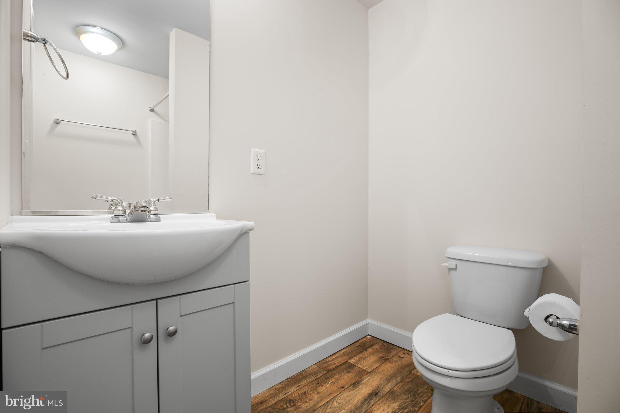 6337 Louisianna Road Locust Grove, VA 22508 - Photo 53 of 75 a bathroom with a sink toilet and a mirror