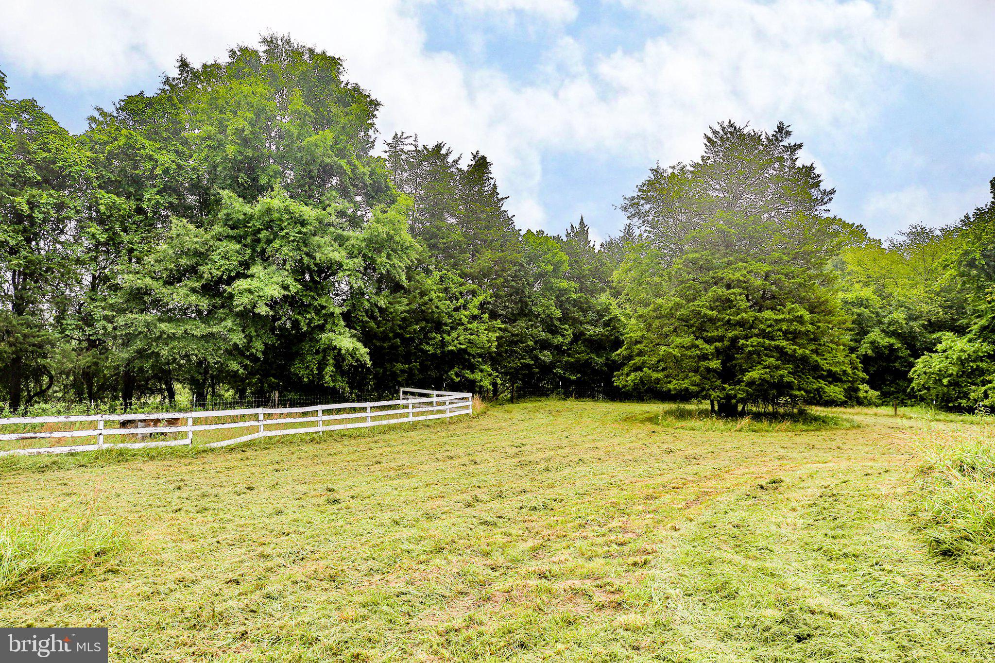 6337 Louisianna Road Locust Grove, VA 22508 - Photo 62 of 75 a view of a swimming pool with an outdoor space and seating area