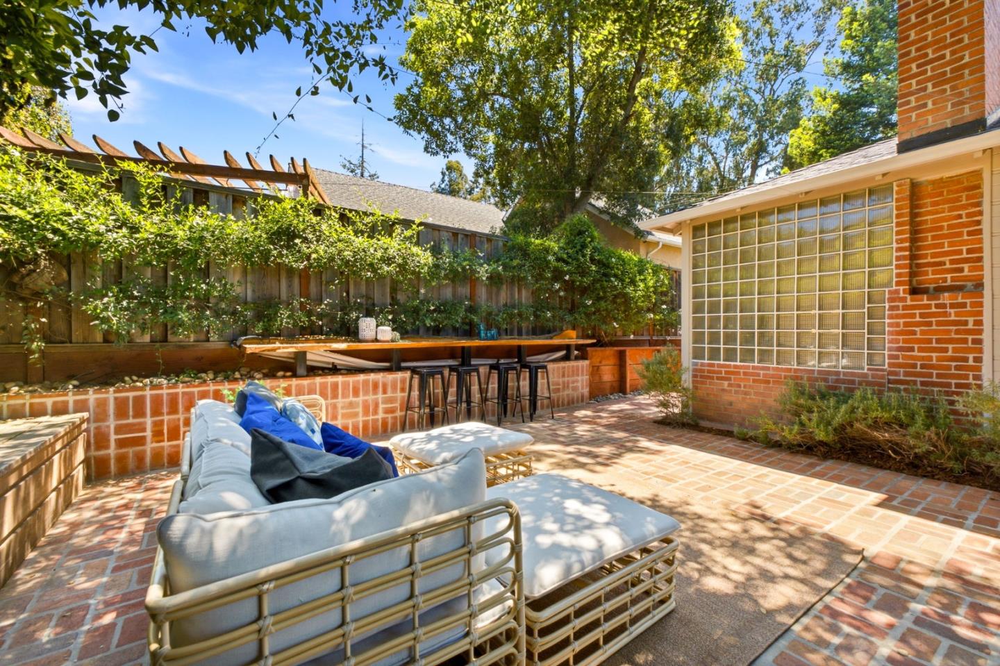 9858 Golf Links Road Oakland, CA 94605 - Photo 29 of 39 a view of a patio with a table