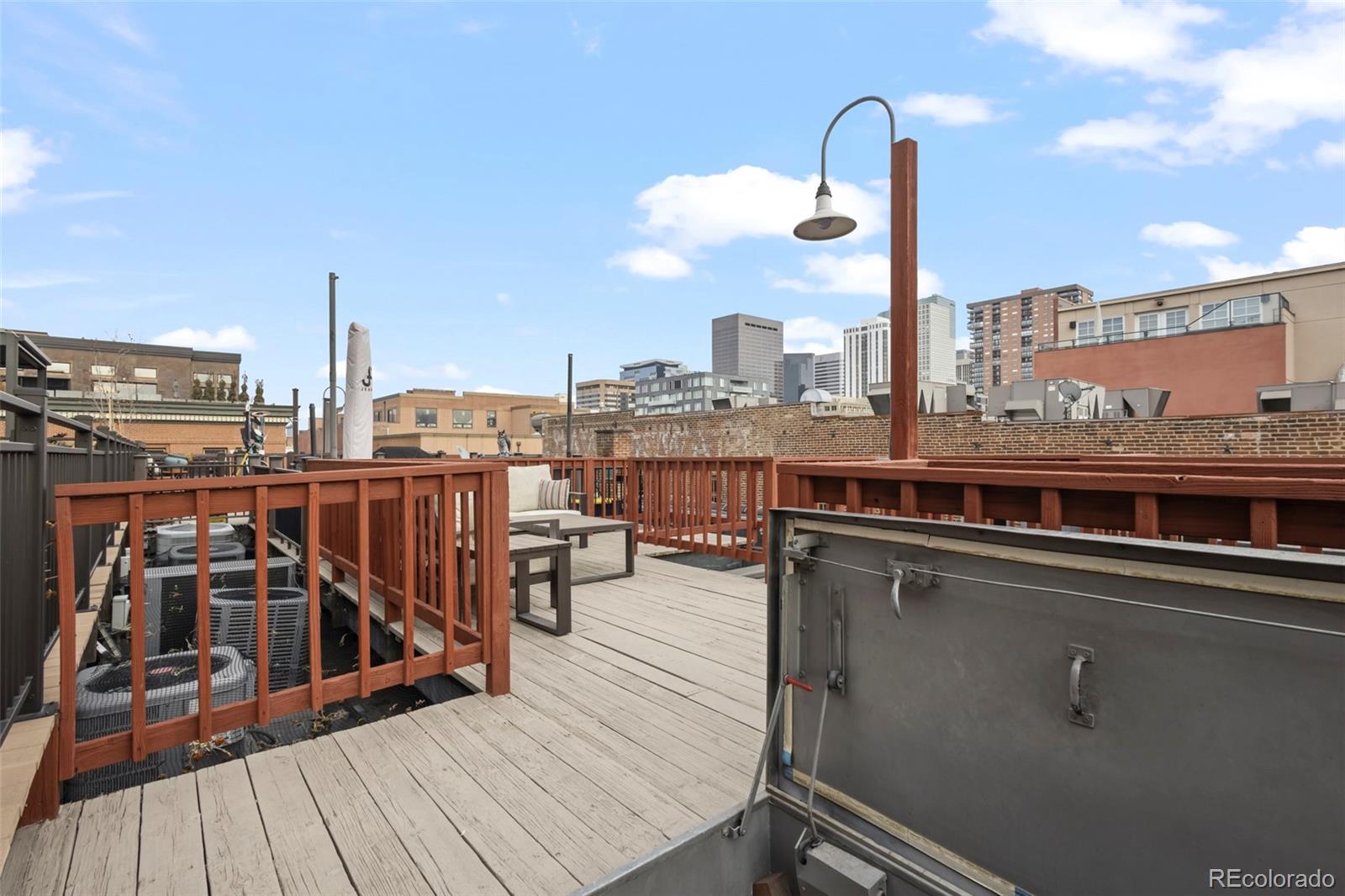 1450 Wynkoop Street, Unit 3F Denver, CO 80202 - Photo 21 of 29 a view of a balcony with wooden floor
