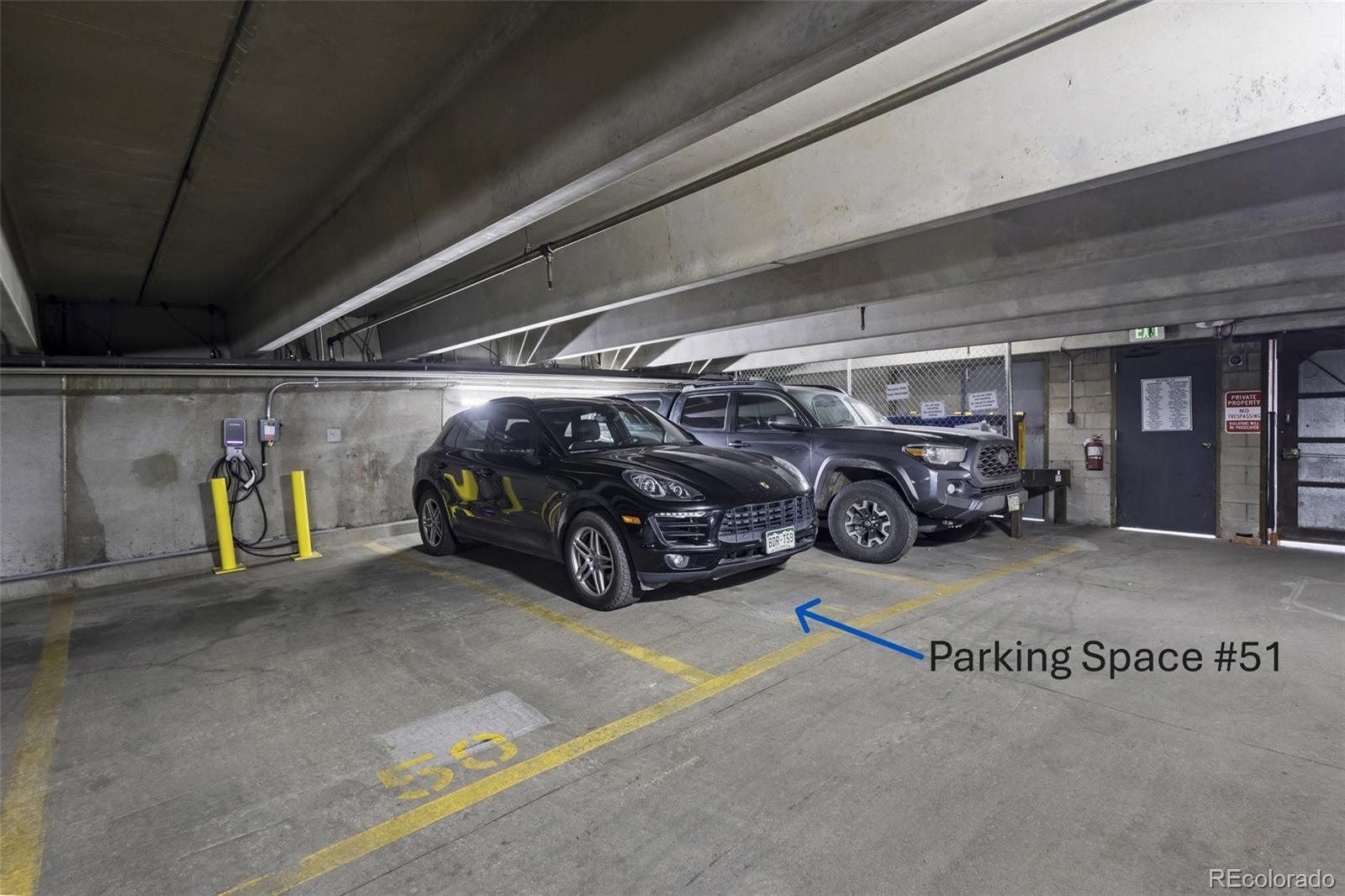 1450 Wynkoop Street, Unit 3F Denver, CO 80202 - Photo 27 of 29 a view of parking garage with cars