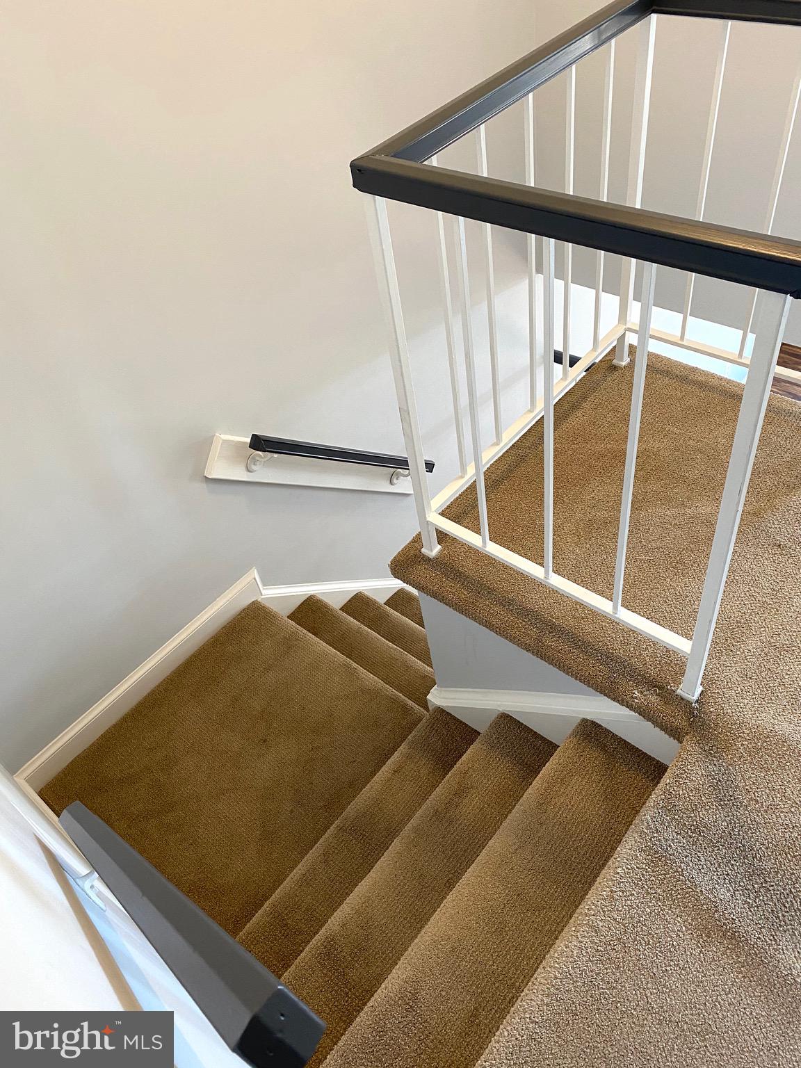 8081 Barcarole Court Springfield, VA 22153 - Photo 22 of 64 Staircase from upper lever down to main level