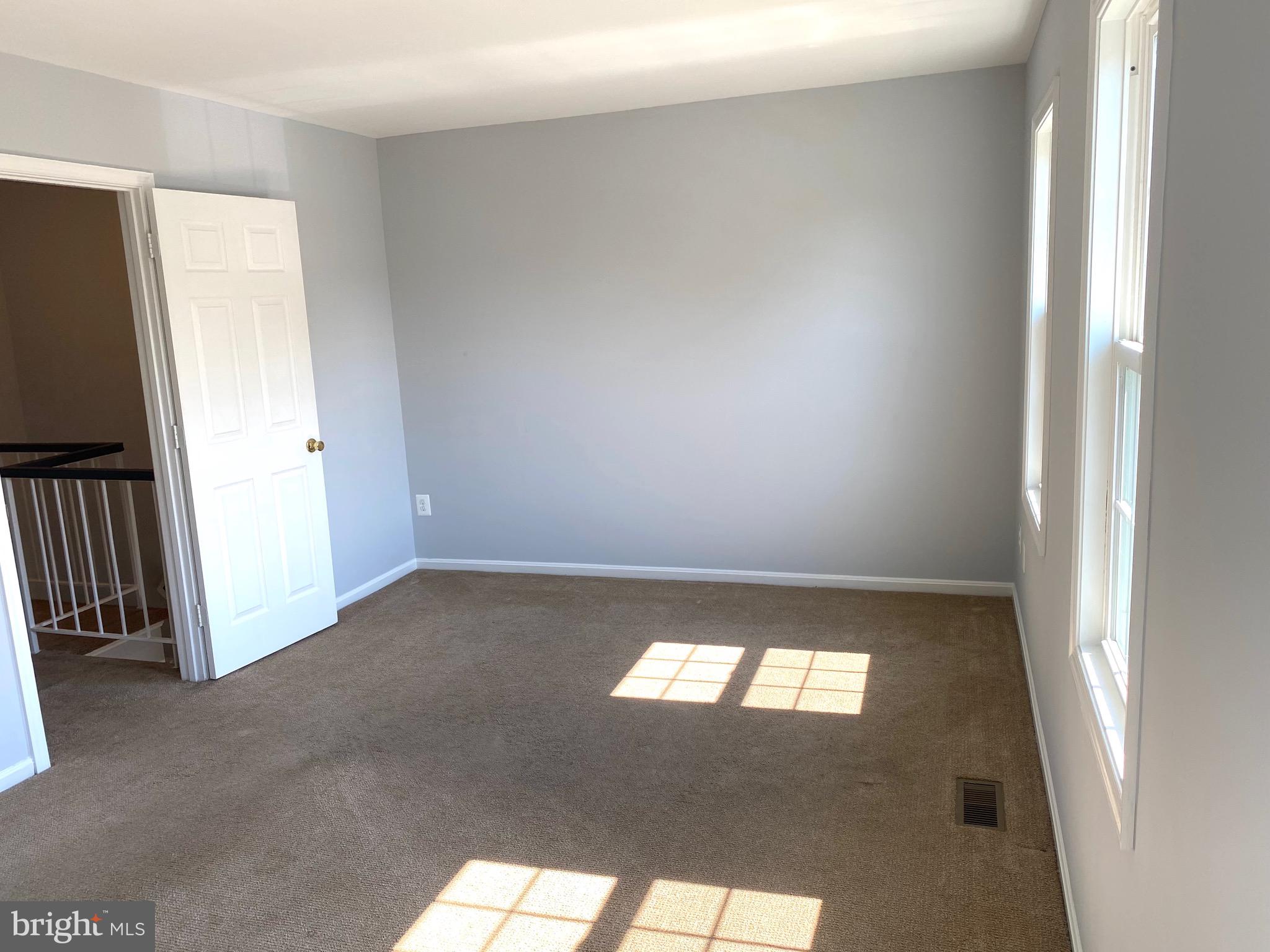 8081 Barcarole Court Springfield, VA 22153 - Photo 27 of 64 a view of an empty room and window