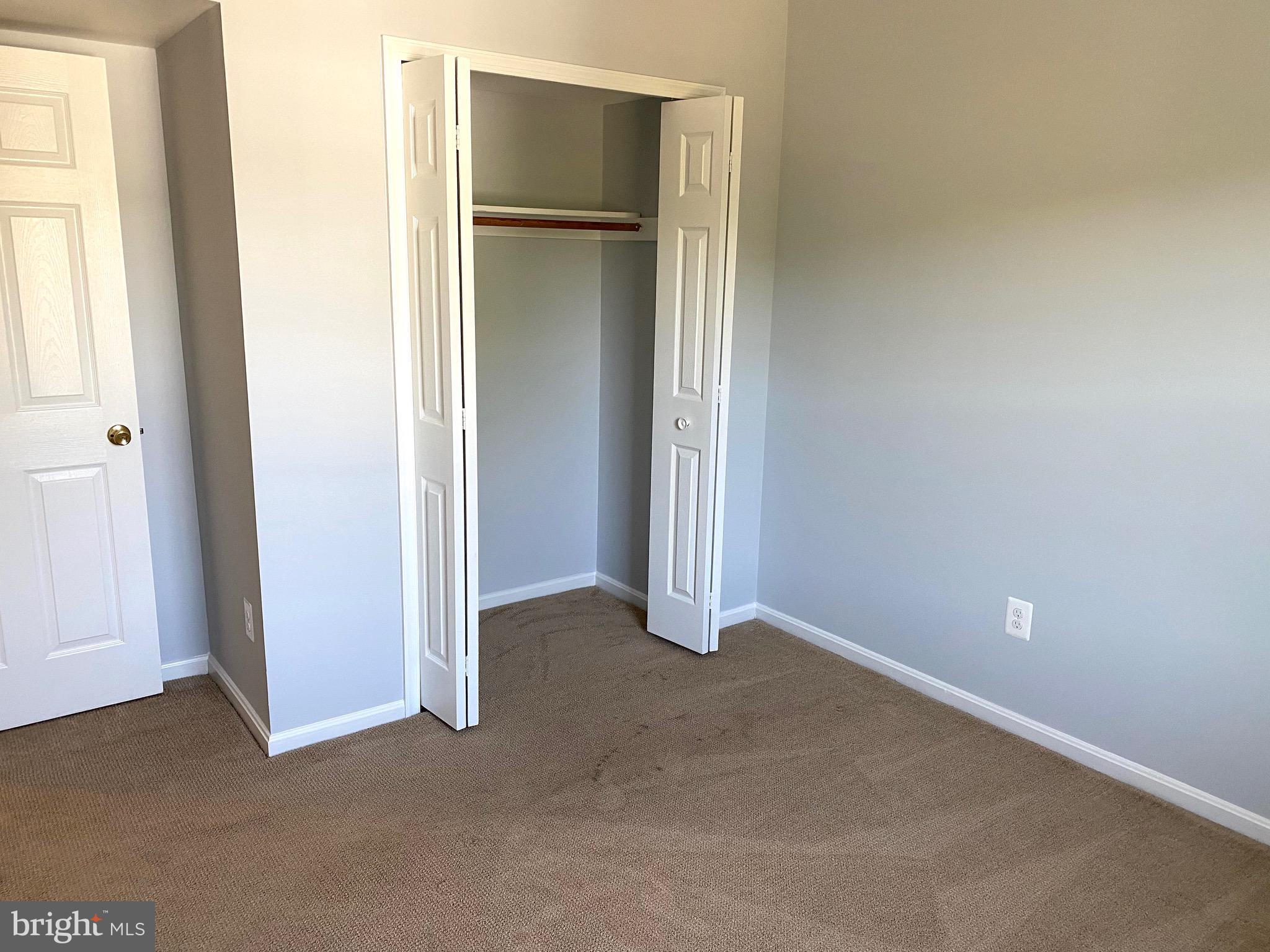 8081 Barcarole Court Springfield, VA 22153 - Photo 34 of 64 an empty room with closet and a window