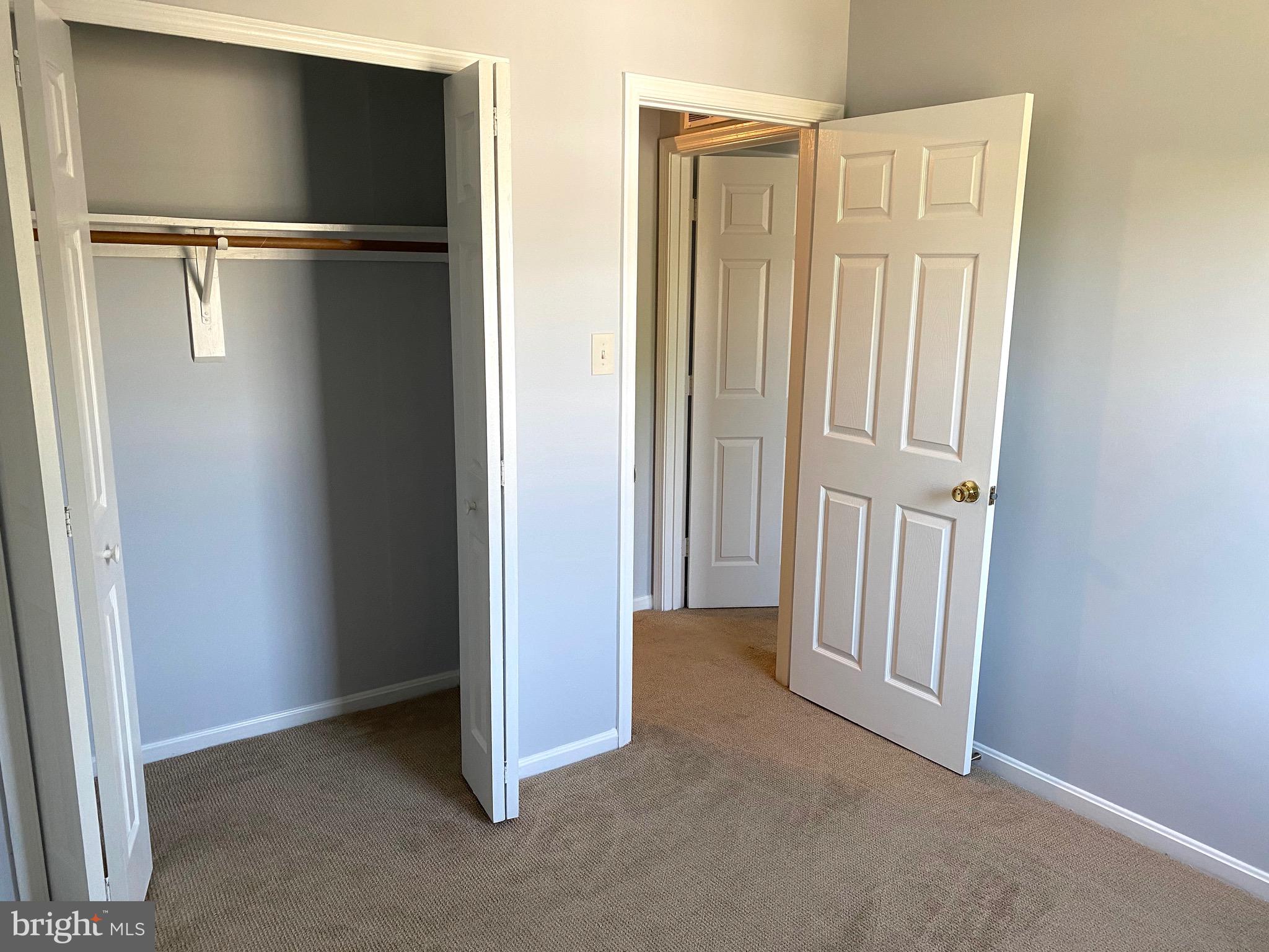 8081 Barcarole Court Springfield, VA 22153 - Photo 40 of 64 Bedroom 3 closet and view to the hallway.