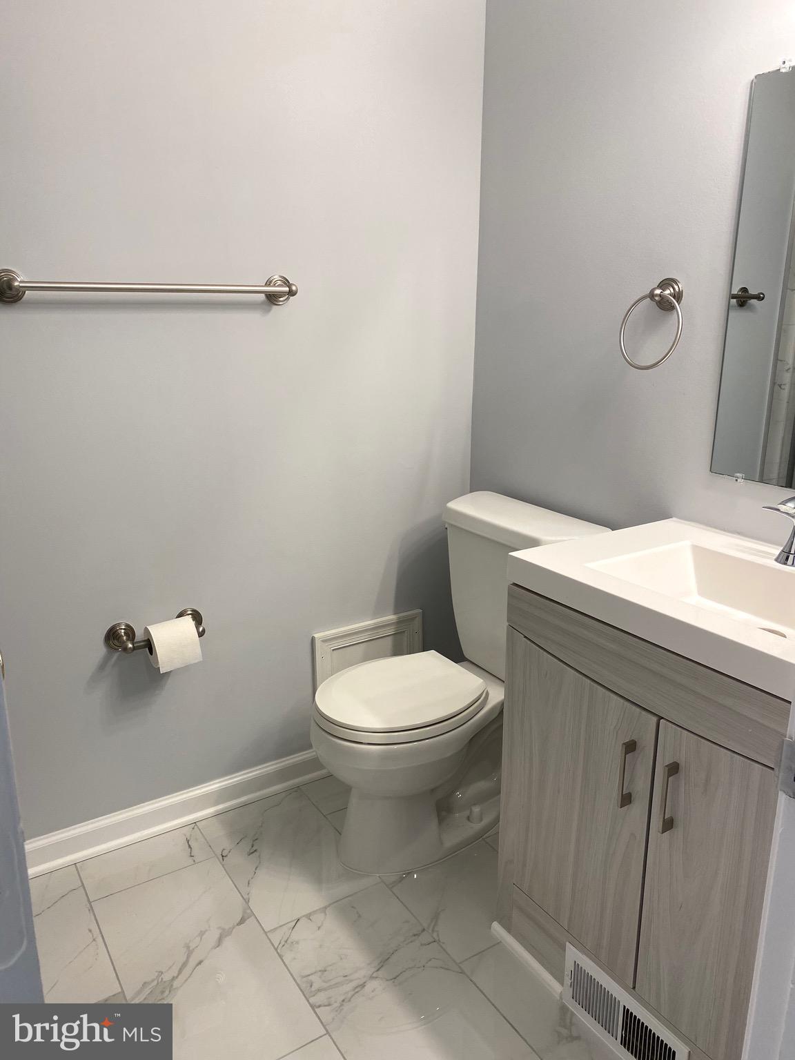 8081 Barcarole Court Springfield, VA 22153 - Photo 43 of 64 a bathroom with a toilet and a shower