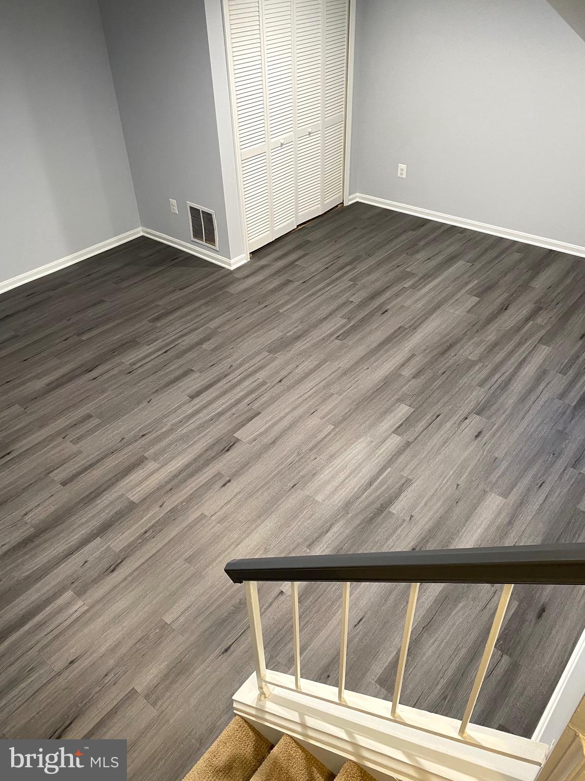 8081 Barcarole Court Springfield, VA 22153 - Photo 45 of 64 a view of wooden floor in a room