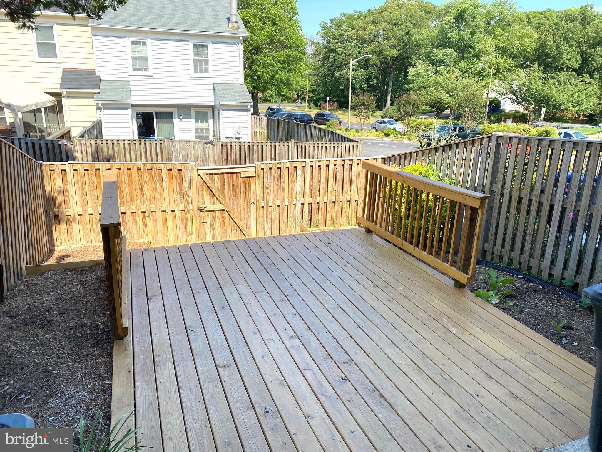 8081 Barcarole Court Springfield, VA 22153 - Photo 57 of 64 a view of a balcony with wooden floor