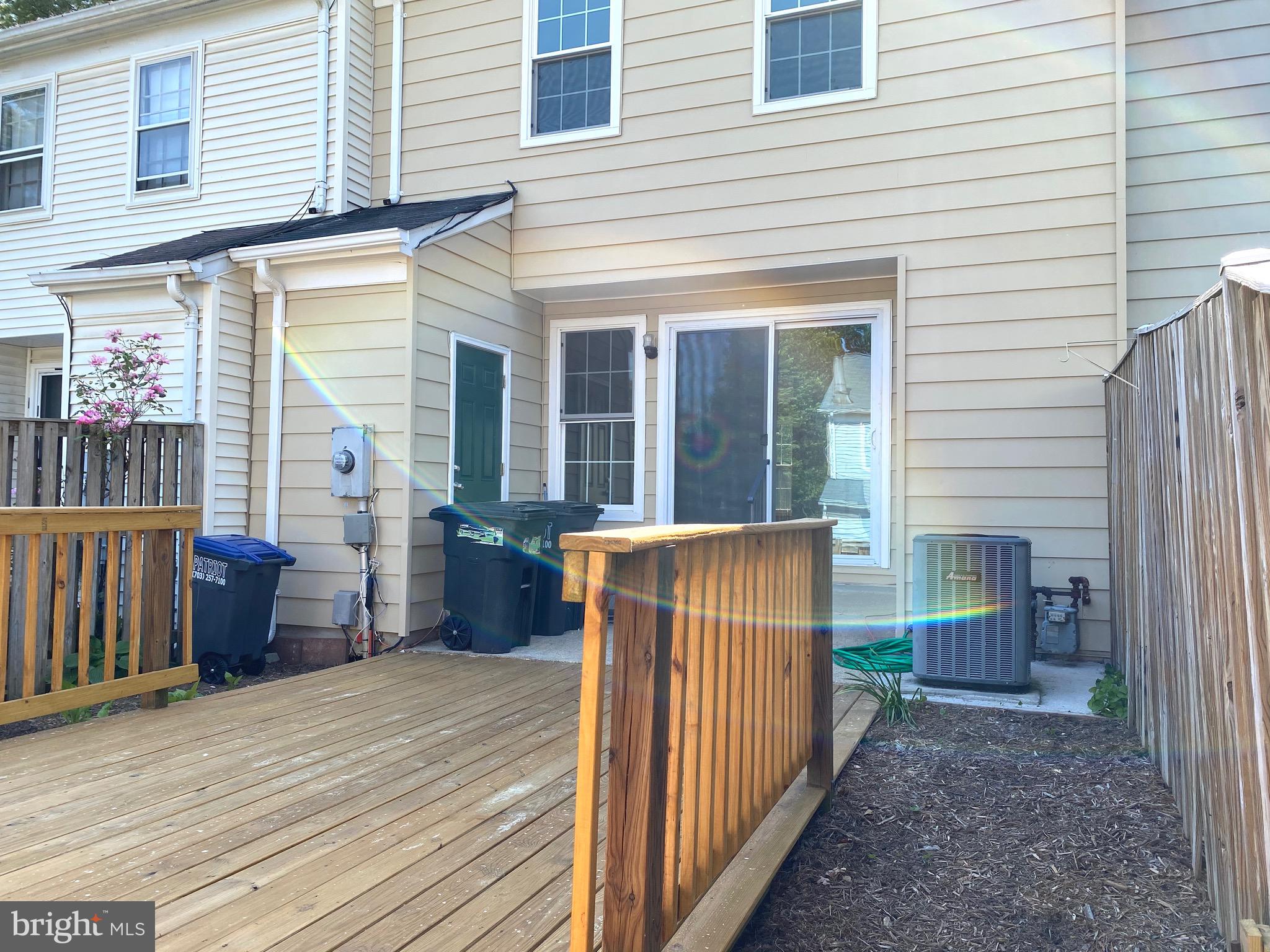 8081 Barcarole Court Springfield, VA 22153 - Photo 61 of 64 a view of a house with wooden fence