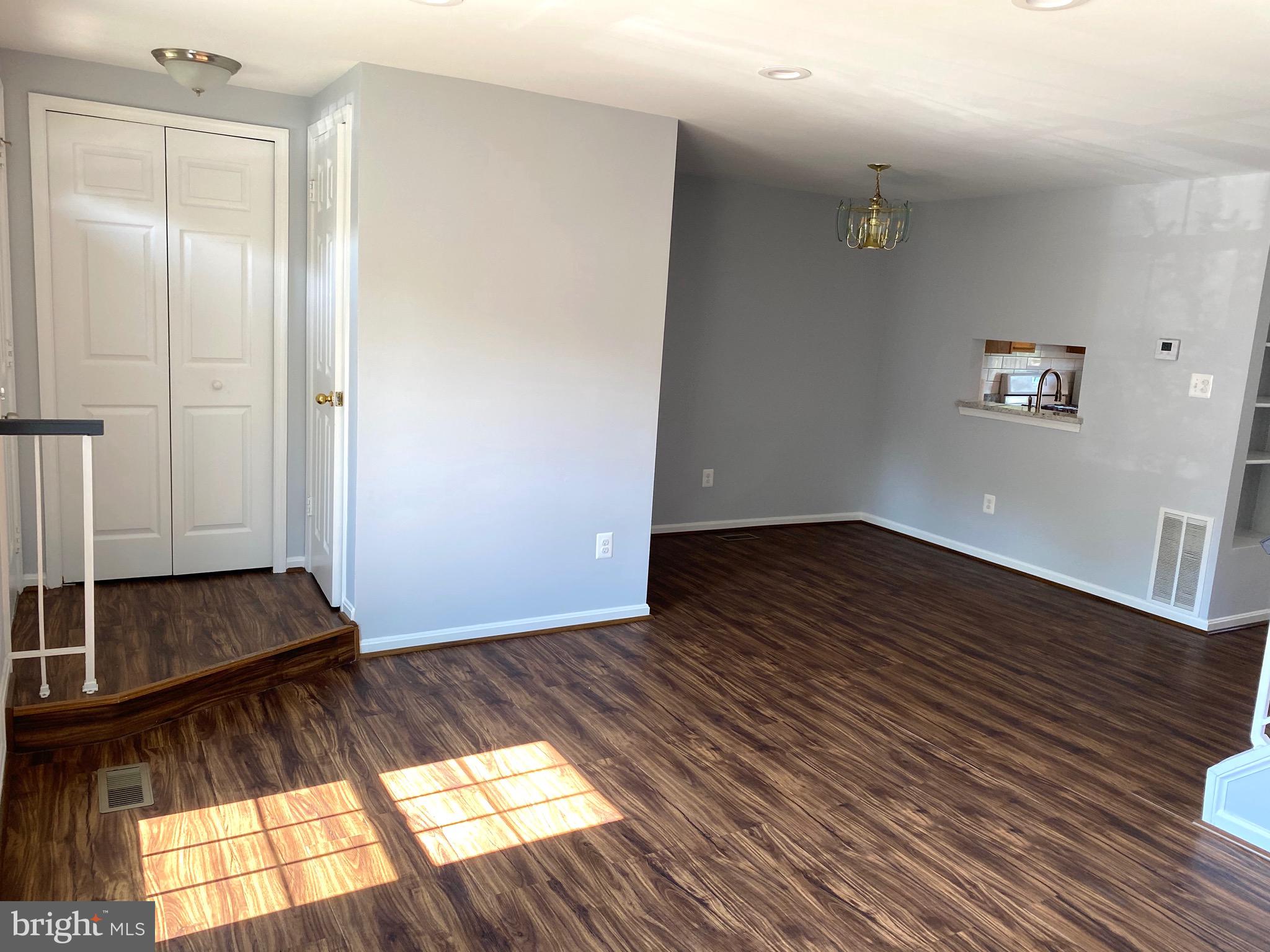 8081 Barcarole Court Springfield, VA 22153 - Photo 8 of 64 wooden floor in an empty room