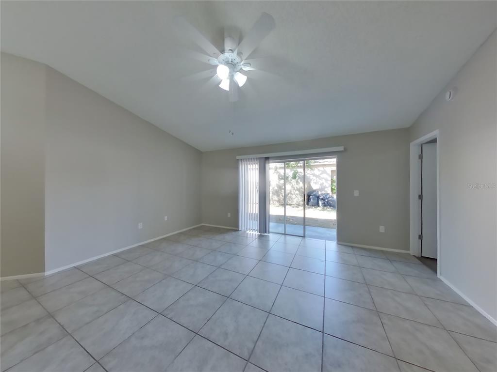 Undisclosed Address Brandon, FL 33511 - Photo 2 of 18 a view of an empty room with a window
