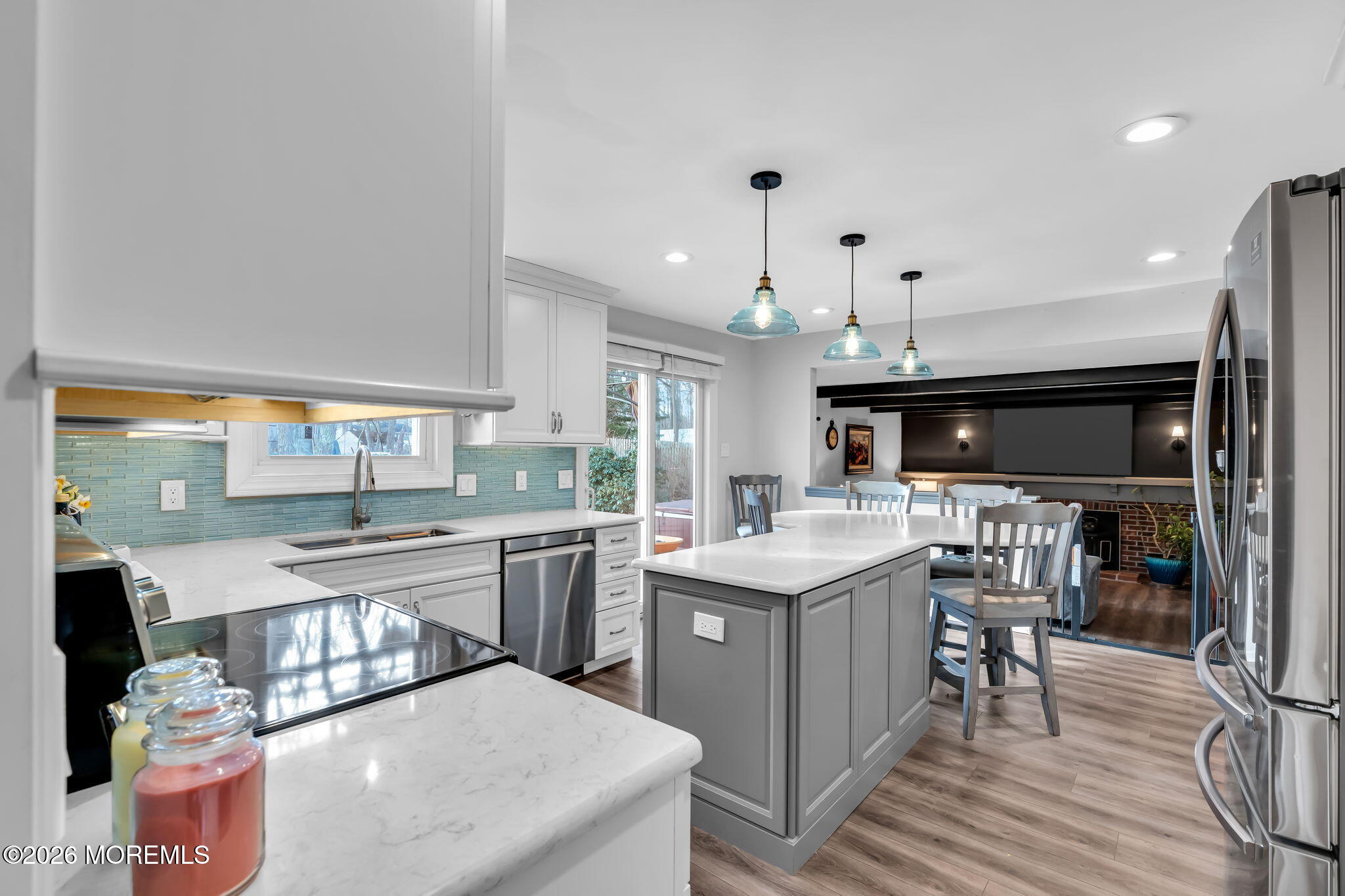 13 Dunbarton Road Jackson, NJ 08527 - Photo 27 of 34 a kitchen with stainless steel appliances granite countertop a sink a stove and a wooden floors