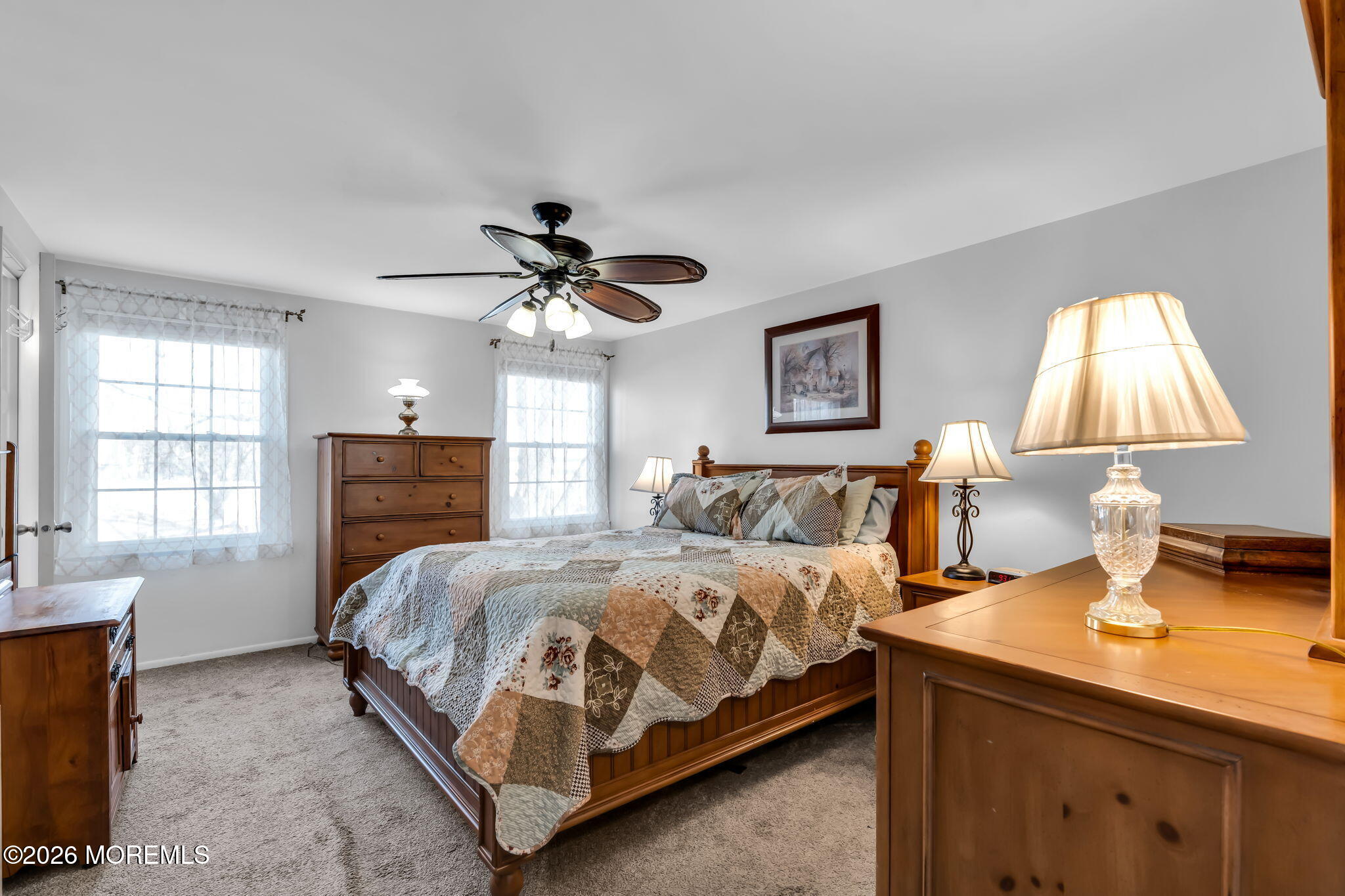 13 Dunbarton Road Jackson, NJ 08527 - Photo 6 of 34 a bedroom with a bed and a table