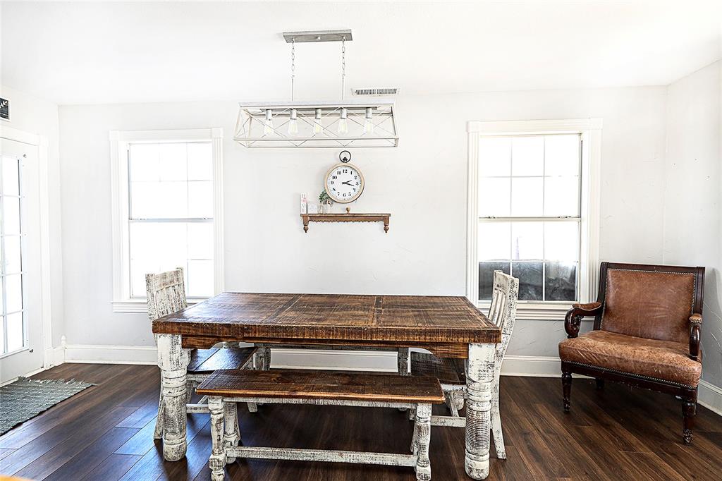 1364 Winn Road Bowie, TX 76230 - Photo 15 of 38 a living room with a stove and a window