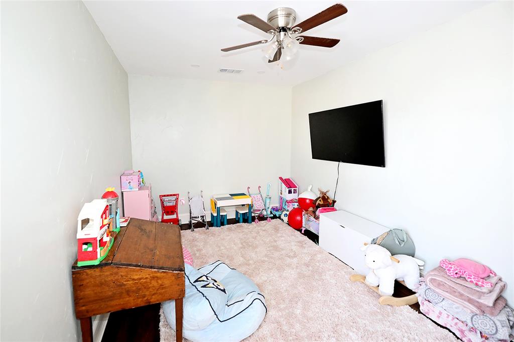 1364 Winn Road Bowie, TX 76230 - Photo 25 of 38 a view of a workspace with furniture