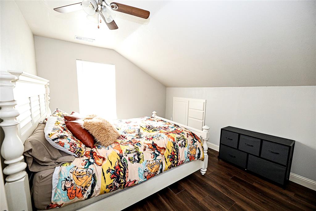 1364 Winn Road Bowie, TX 76230 - Photo 28 of 38 a bedroom with bed and a window