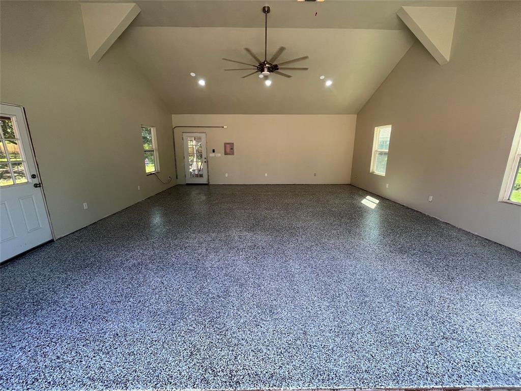 1364 Winn Road Bowie, TX 76230 - Photo 38 of 38 an empty room with a ceiling fan and window