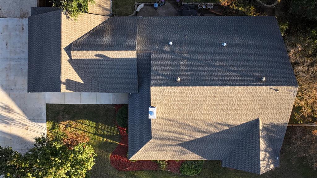 1364 Winn Road Bowie, TX 76230 - Photo 4 of 38 a front view of a house with a yard