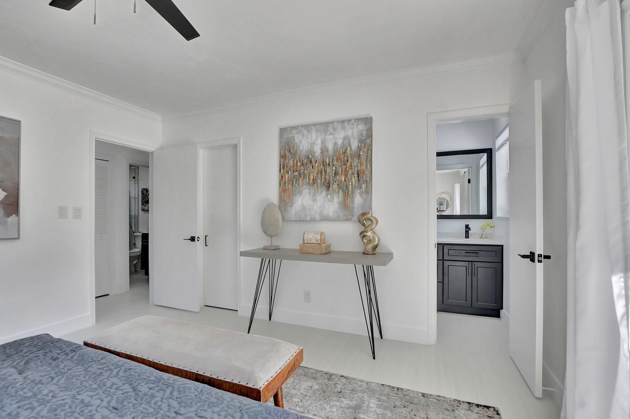 832 Southwest 10th Avenue Boca Raton, FL 33486 - Photo 23 of 57 a living room with furniture and a rug