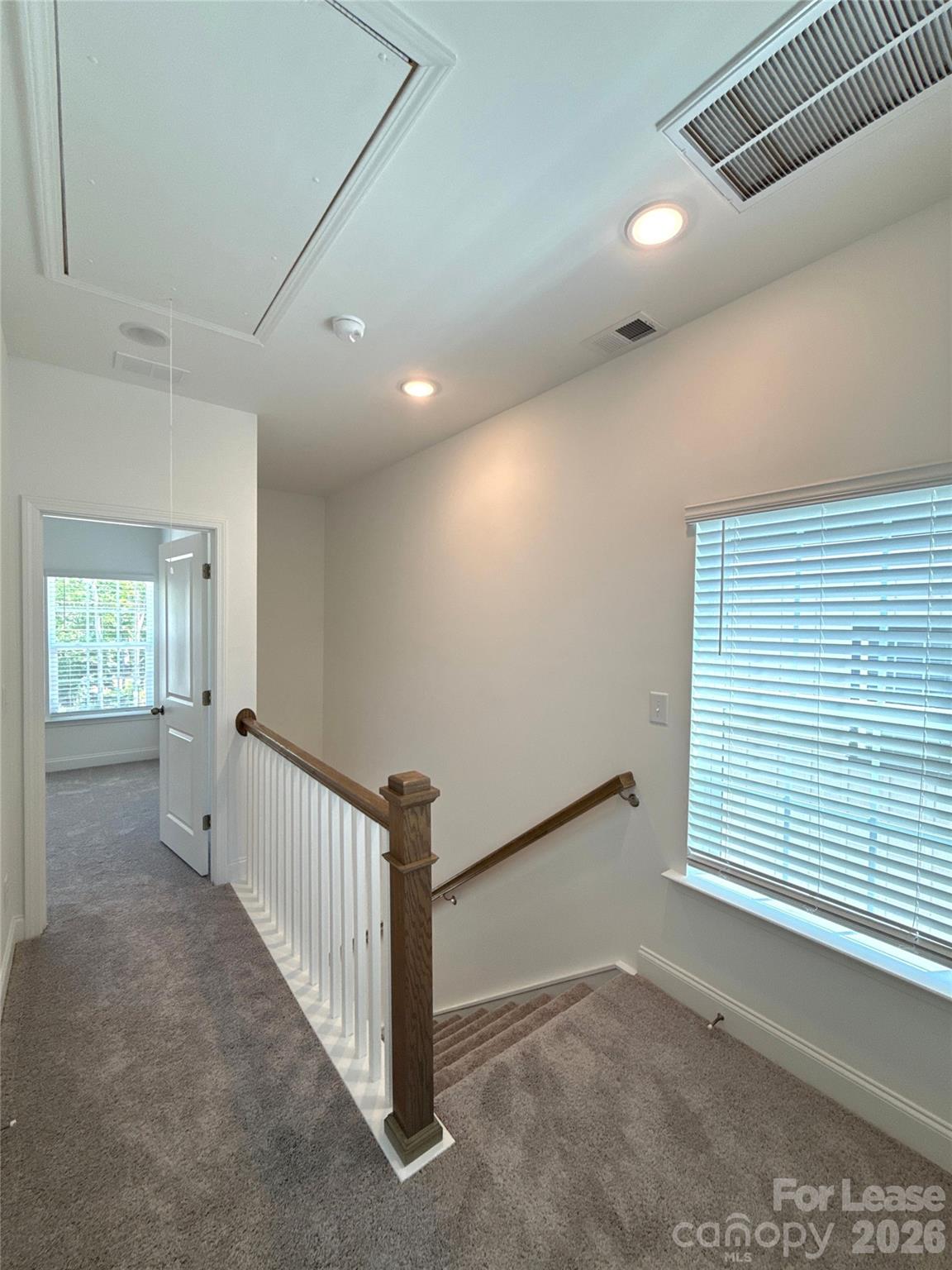 3220 Butler Hl Drive Matthews, NC 28105 - Photo 9 of 11 a view of a hallway with window