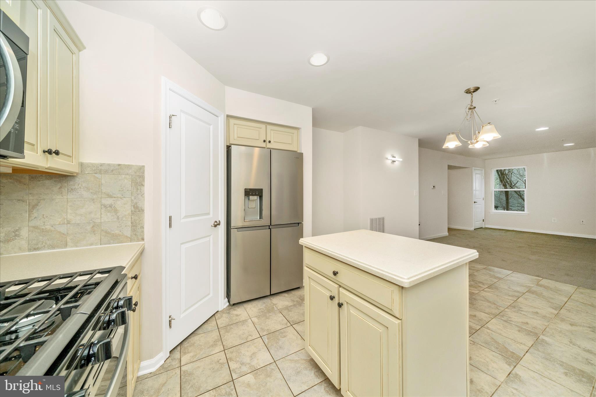 7014 Linden Avenue Elkridge, MD 21075 - Photo 19 of 42 a kitchen with a sink appliances and cabinets