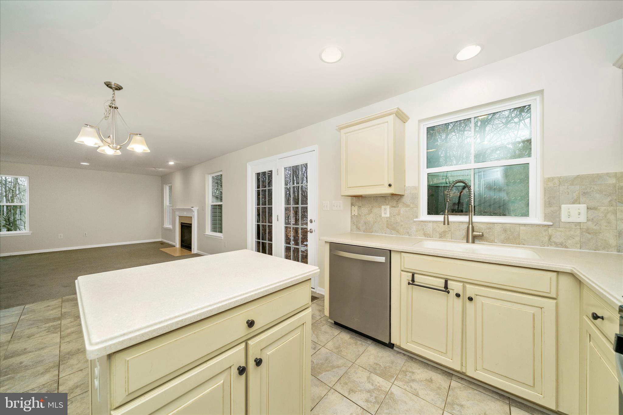 7014 Linden Avenue Elkridge, MD 21075 - Photo 20 of 42 a kitchen with a sink and cabinets