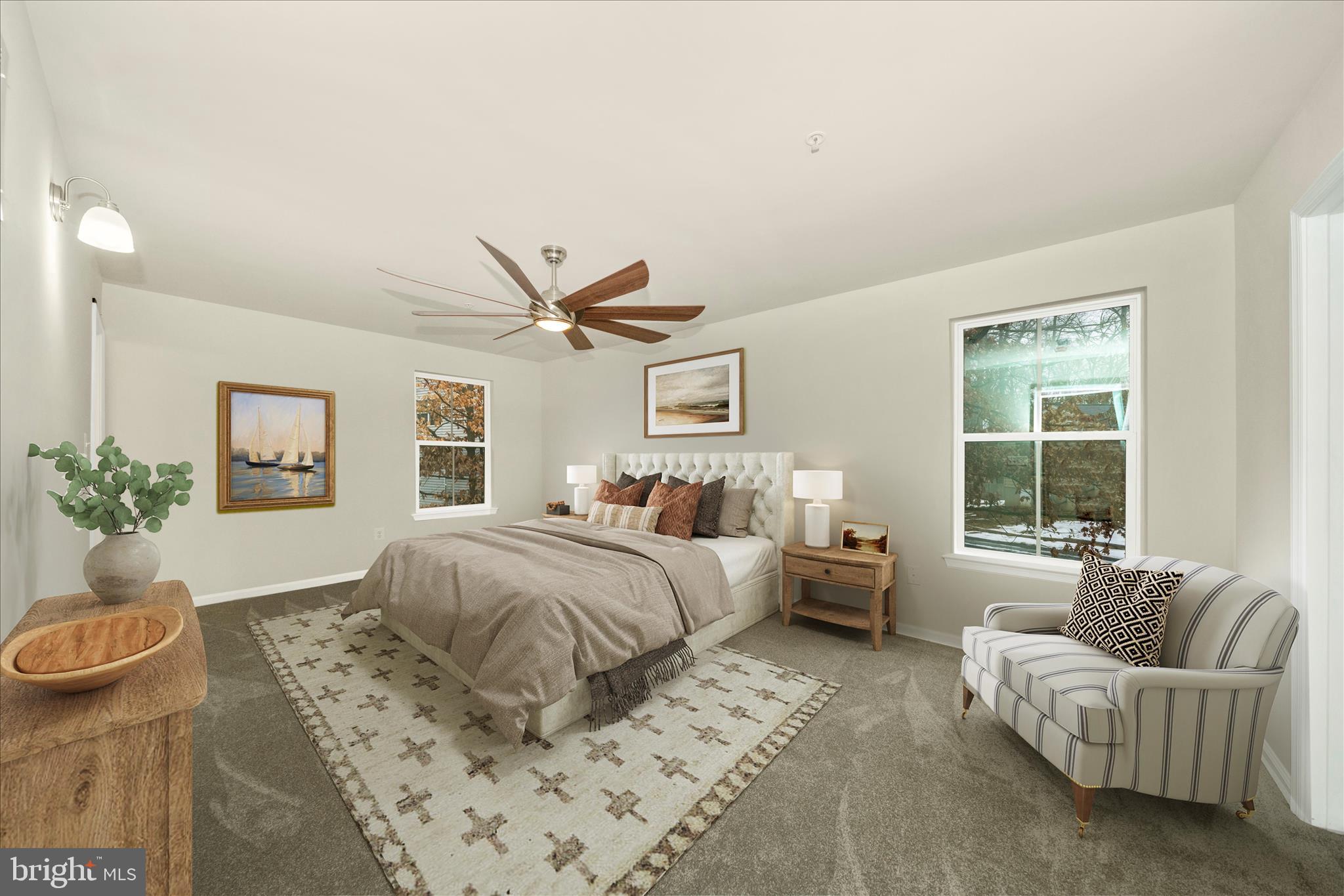 7014 Linden Avenue Elkridge, MD 21075 - Photo 22 of 42 a spacious bedroom with a bed and glass window