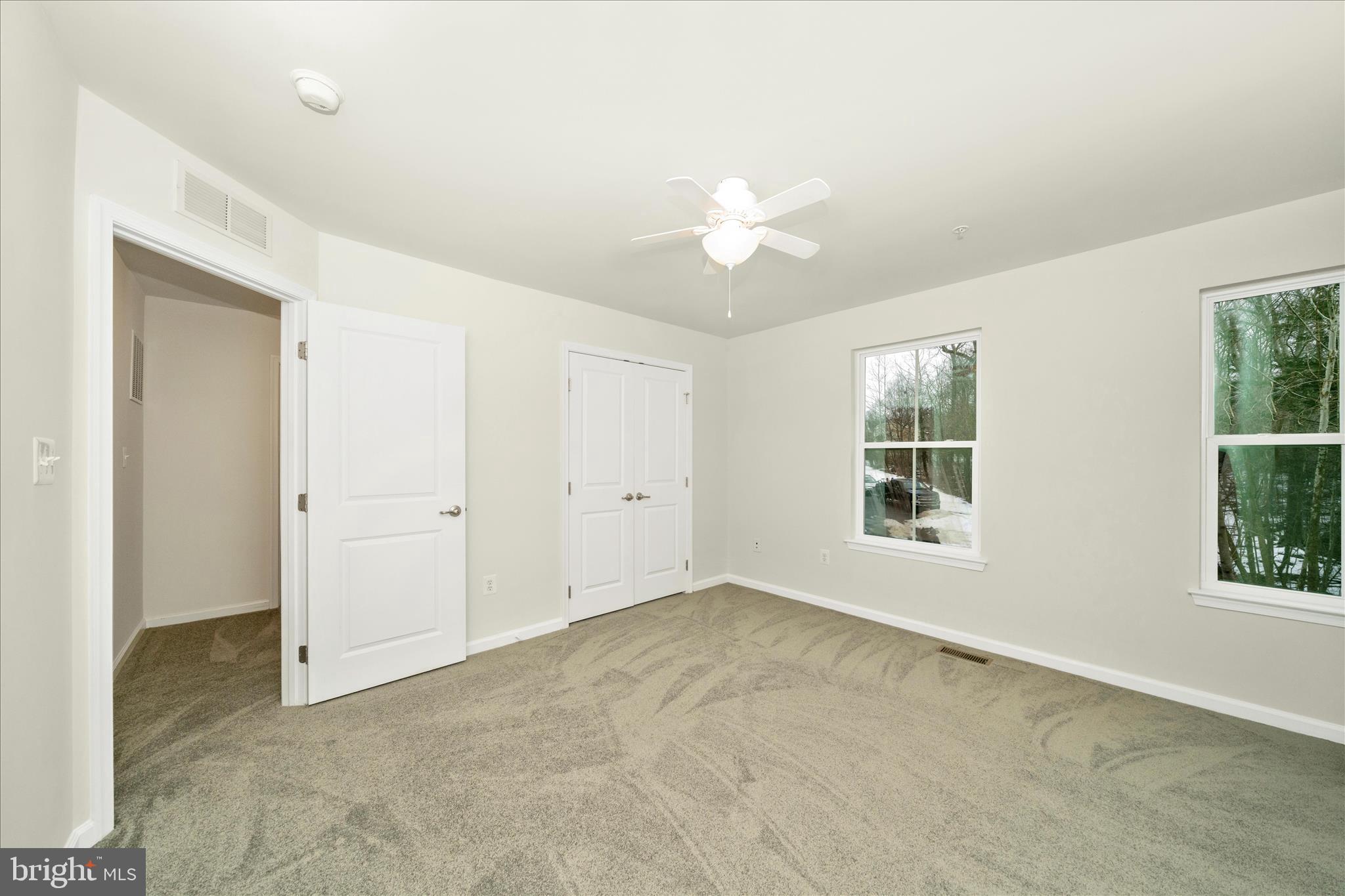 7014 Linden Avenue Elkridge, MD 21075 - Photo 31 of 42 an empty room with windows and closet