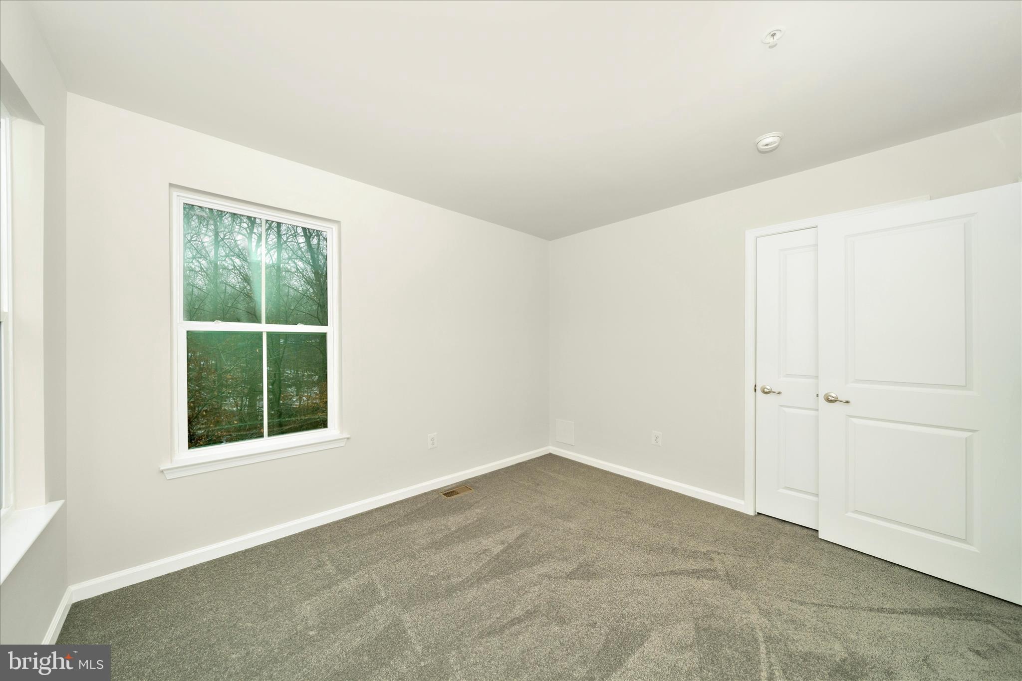 7014 Linden Avenue Elkridge, MD 21075 - Photo 32 of 42 an empty room with a window