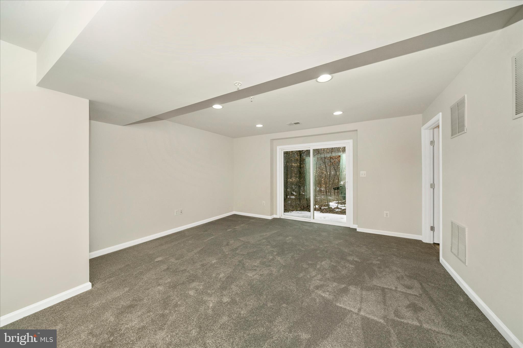 7014 Linden Avenue Elkridge, MD 21075 - Photo 36 of 42 a view of an empty room with a window