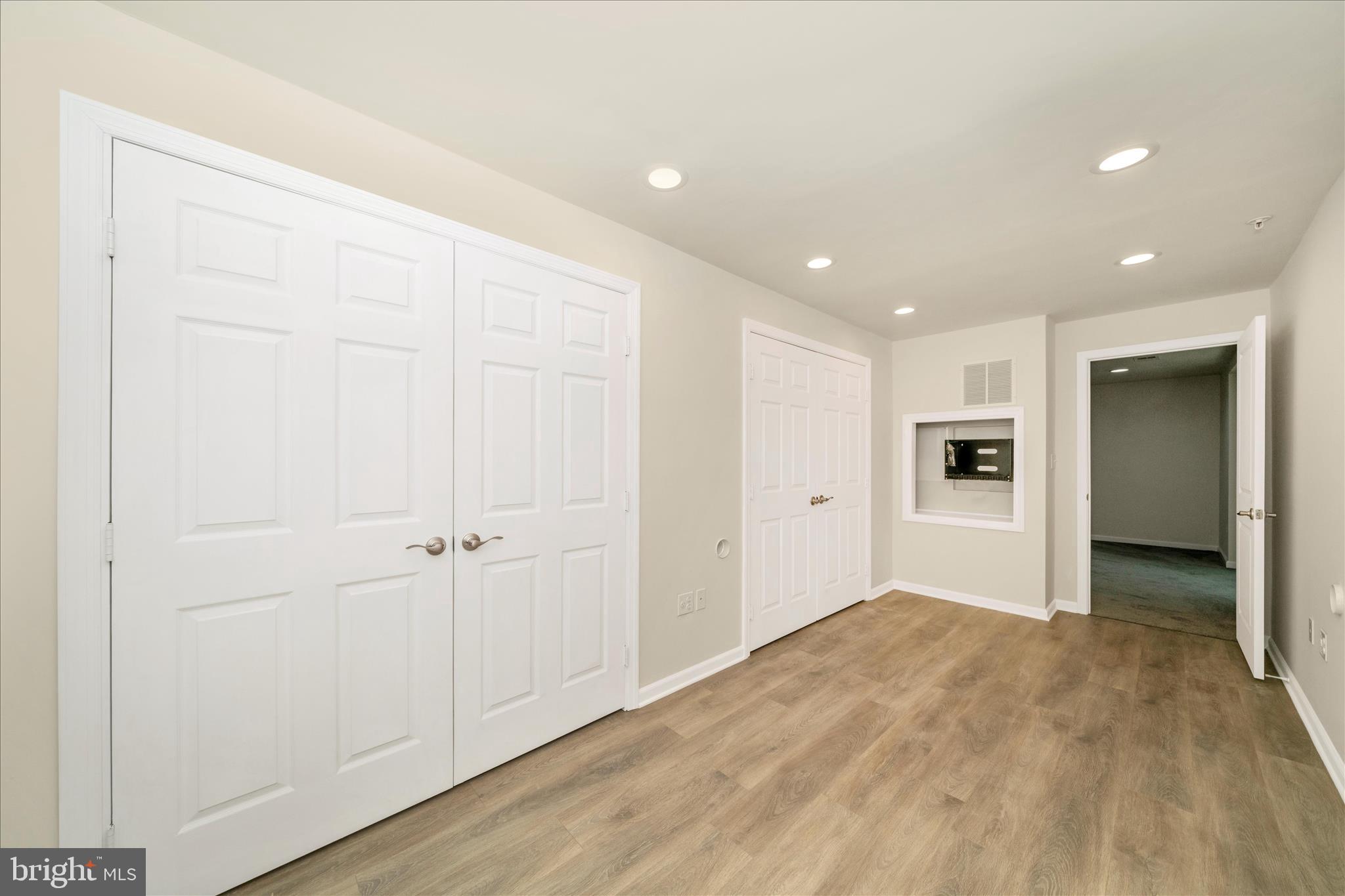 7014 Linden Avenue Elkridge, MD 21075 - Photo 41 of 42 a view of a big room with wooden floor