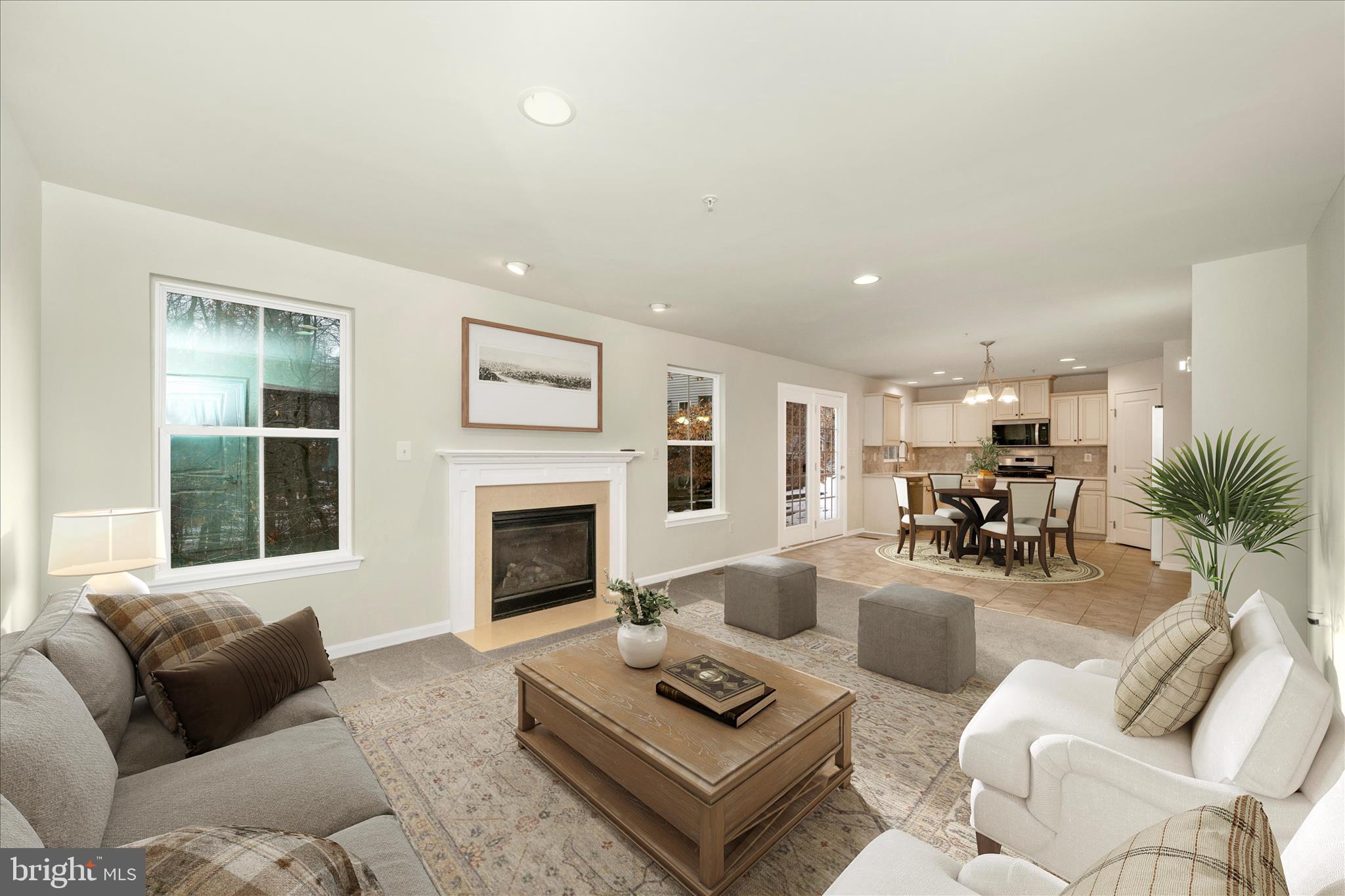 7014 Linden Avenue Elkridge, MD 21075 - Photo 10 of 42 a living room with furniture fireplace and window