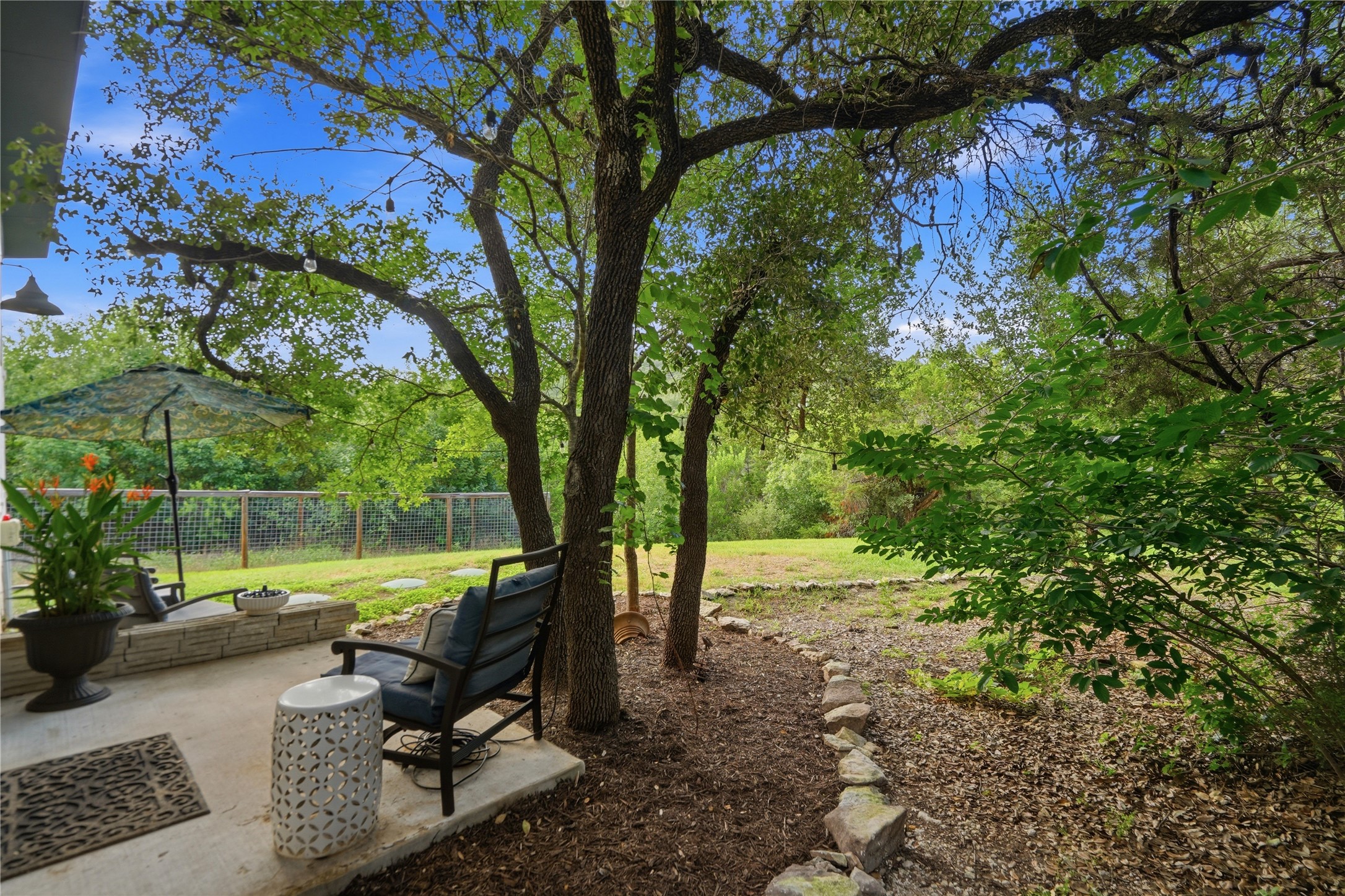18406 Roundrock Road Jonestown, TX 78645 - Photo 27 of 33 a view of a park with large trees