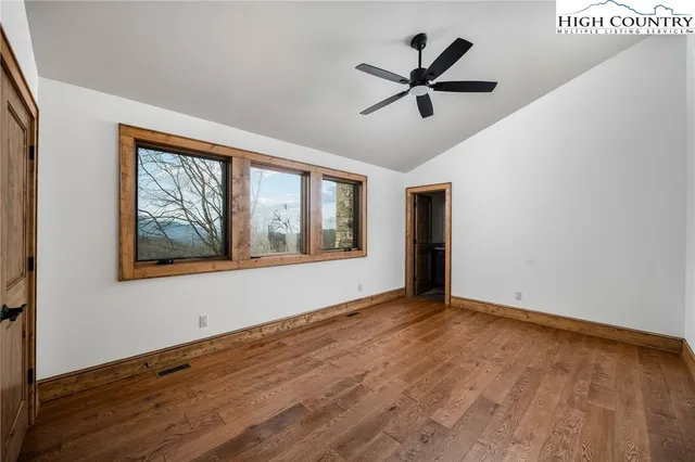 a view of fireplace with wooden floor